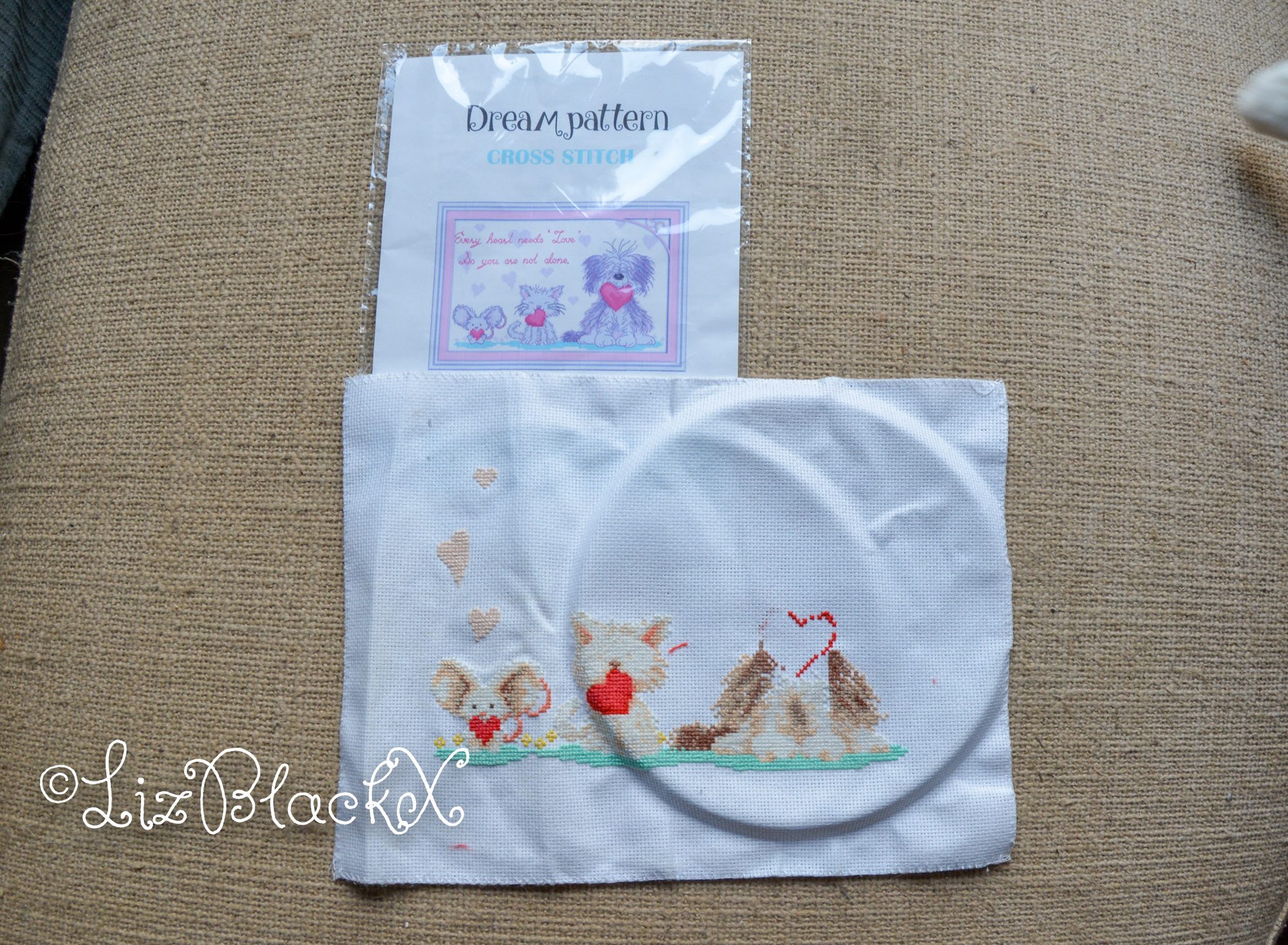 Cross stitch work of three animals and hearts
Copyright Liz BlackX